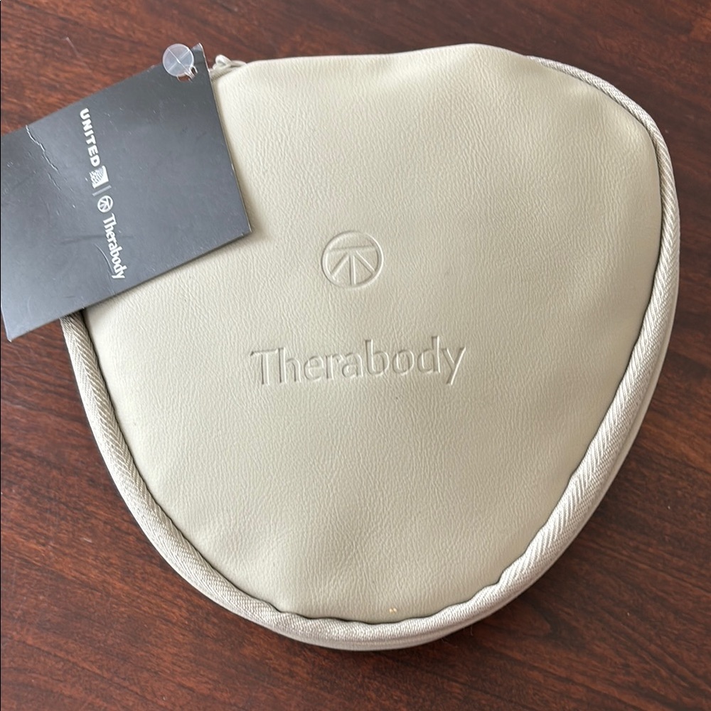 United Polaris Therabody pouch and toiletries NWT